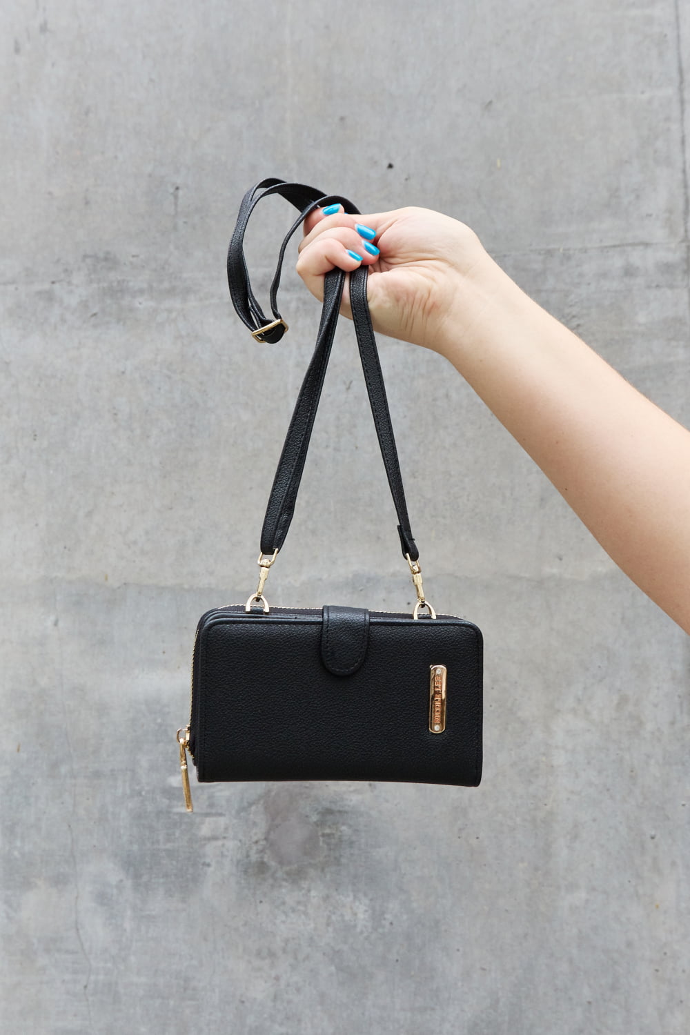 Nicole Lee USA Two-Piece Crossbody Phone Case Wallet in pebbled vegan leather, featuring a universal phone holder and multiple card slots.