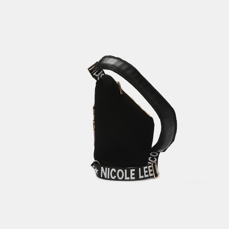 Nicole Lee USA Vegan Leather Crossbody Bag featuring leopard and lip patterns, adjustable strap, and gold-tone hardware.
