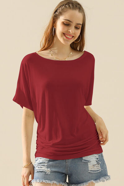 Ninexis Boat Neck Short Sleeve Ruched Side Top in soft fabric with elegant boat neckline and ruched side detailing.