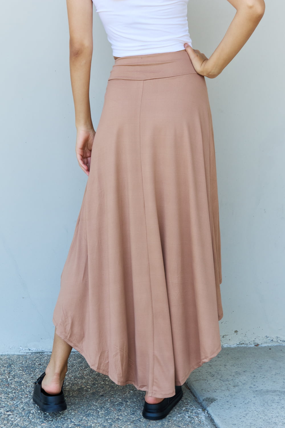 Ninexis First Choice High Waisted Flare Maxi Skirt in Camel, featuring a high-rise waistband and asymmetrical hemline.