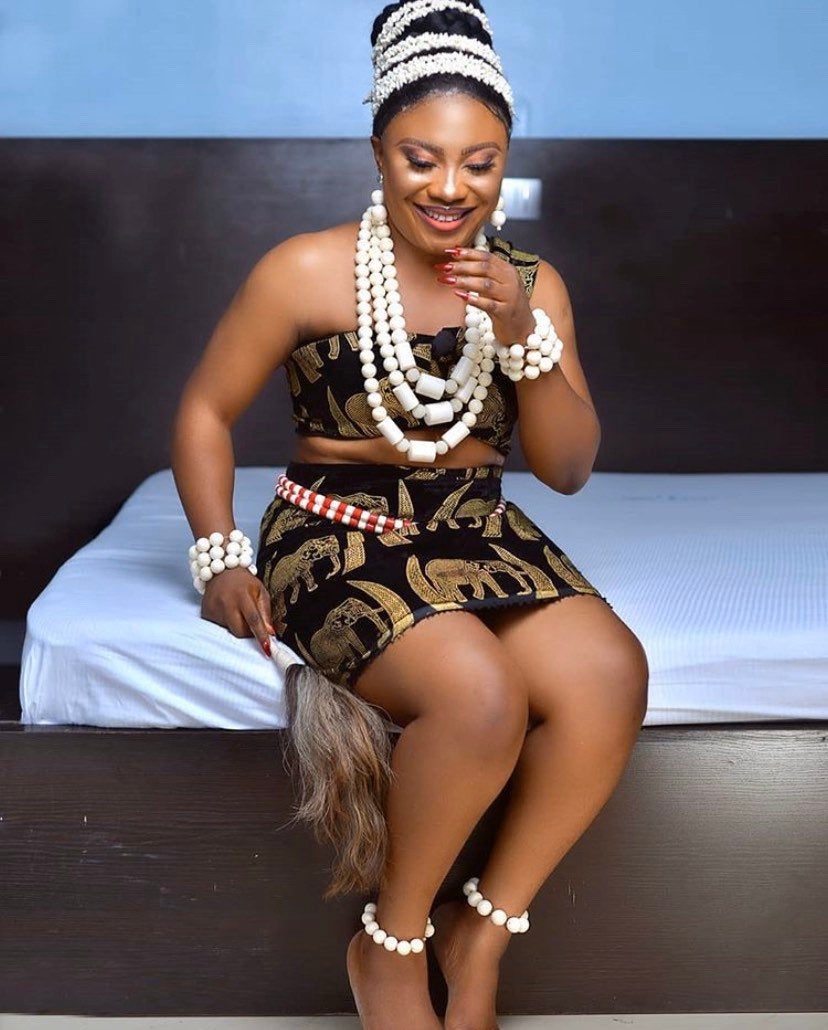 Obiageli African Set featuring a stylish top and matching bottoms in vibrant colors and patterns, showcasing African cultural design.