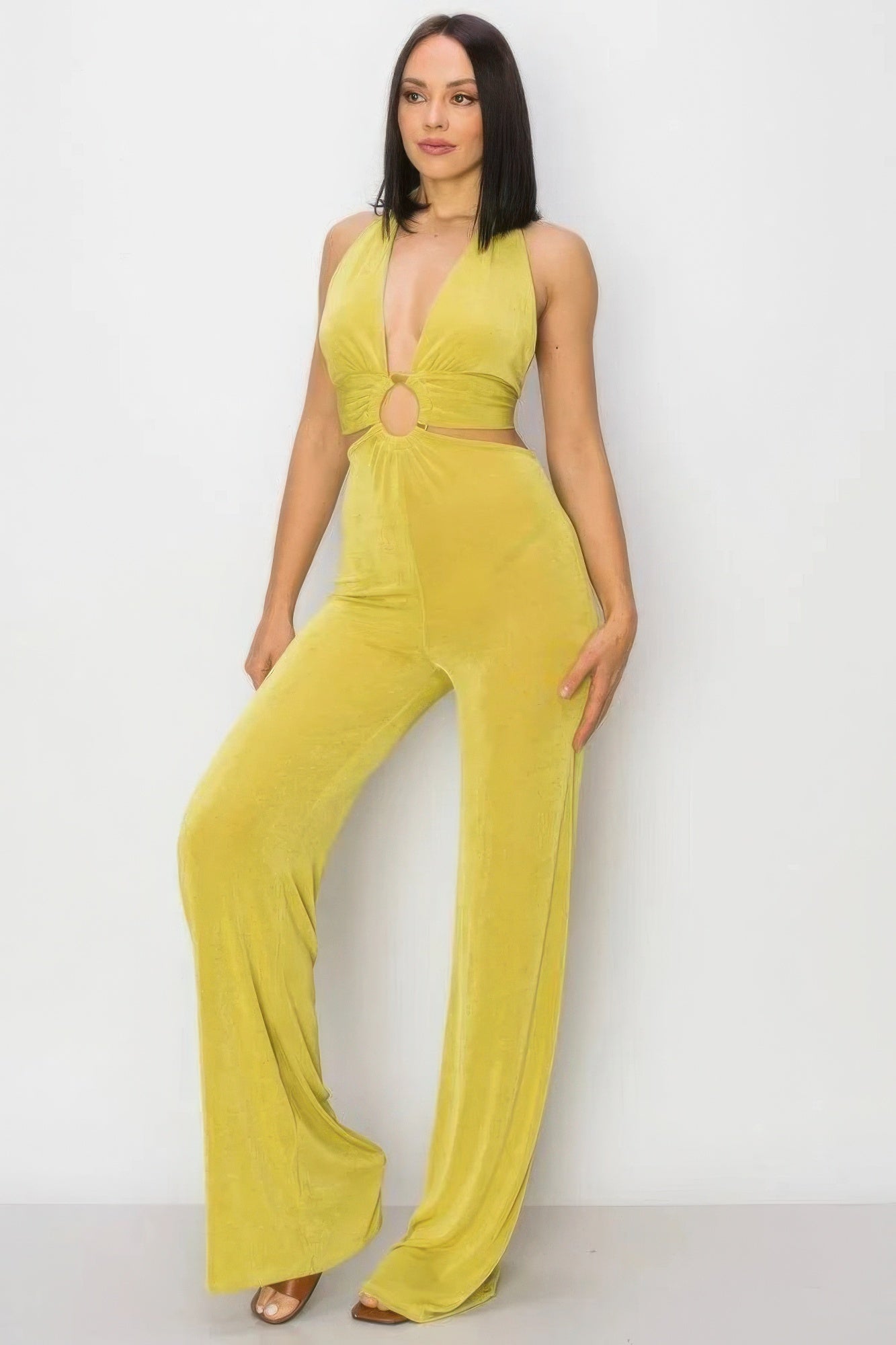Solid Slinky Wide Legs Jumpsuit in vibrant lime green with modern o-ring detail, showcasing a chic wide-leg silhouette.