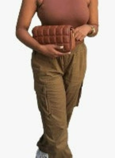 Olive cargo trousers with elasticated waist and slim fit design, featuring pockets for functionality.