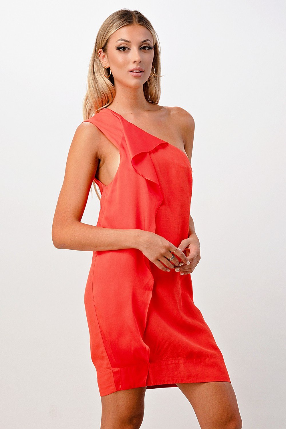 A stylish one shoulder ruffle dress in a vibrant color, showcasing elegant ruffle detailing and a flattering silhouette.