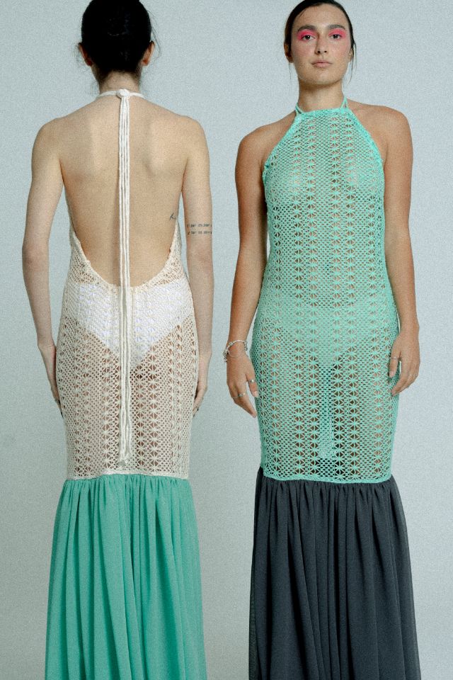 Open back cotton crochet dress in mint green with dark grey chiffon hem, showcasing a body-hugging design and adjustable strings.