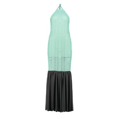 Open back cotton crochet dress in mint green with dark grey chiffon hem, showcasing a body-hugging design and adjustable strings.