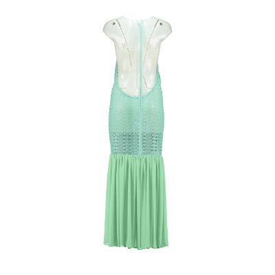 Open back cotton crochet maxi dress in mint green with light green chiffon hem, showcasing a stylish and elegant design.