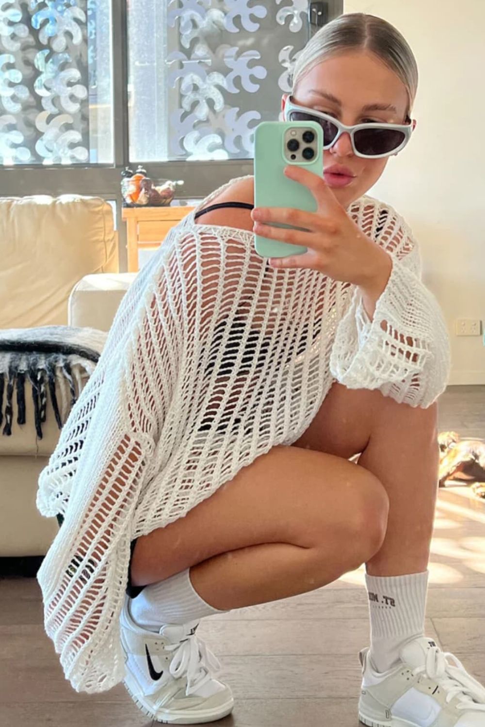 Openwork Boat Neck Long Sleeve Cover Up in solid color, featuring sheer fabric and long sleeves, perfect for beachwear.