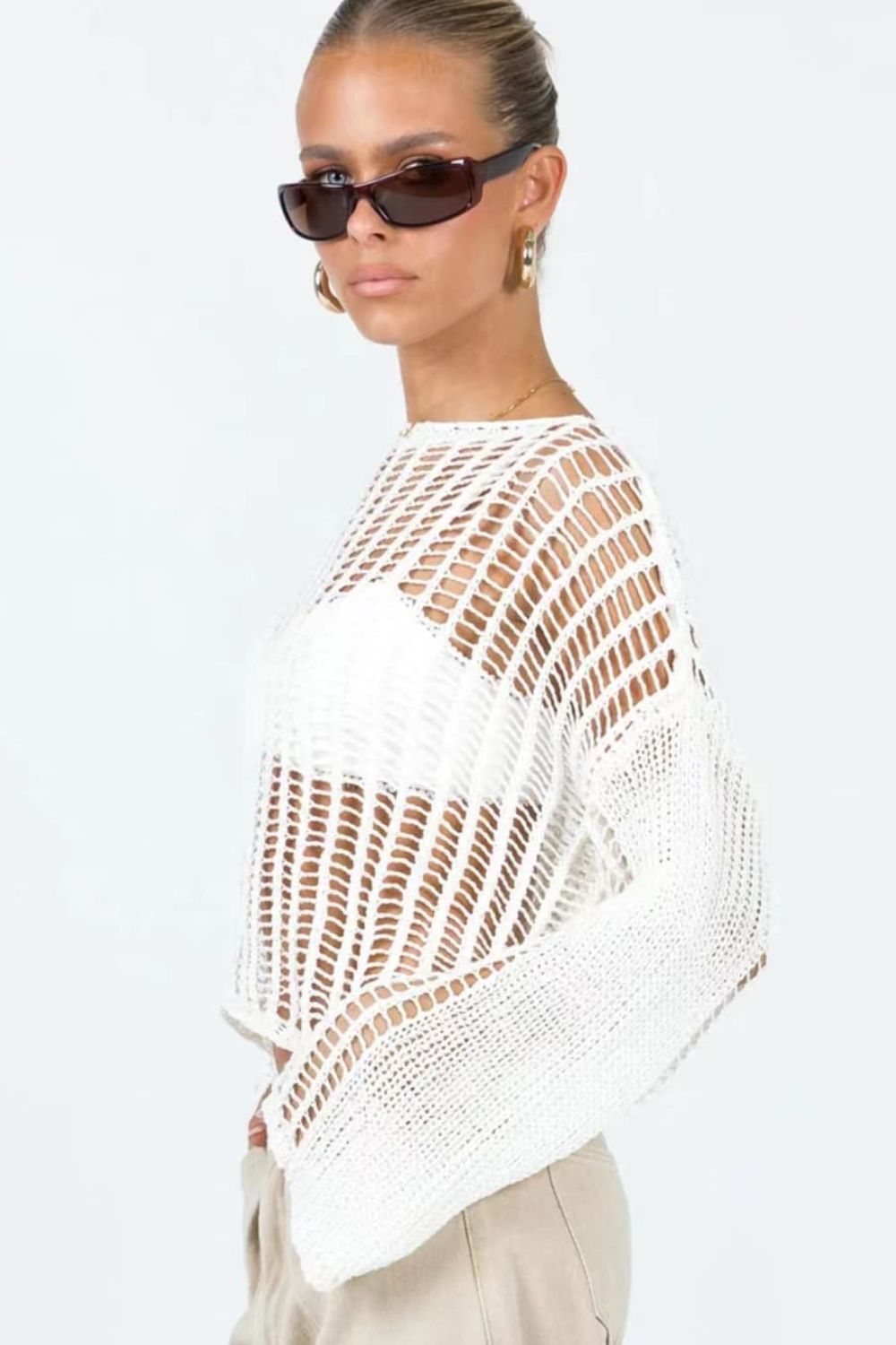 Openwork Boat Neck Long Sleeve Cover Up in solid color, featuring sheer fabric and long sleeves, perfect for beachwear.