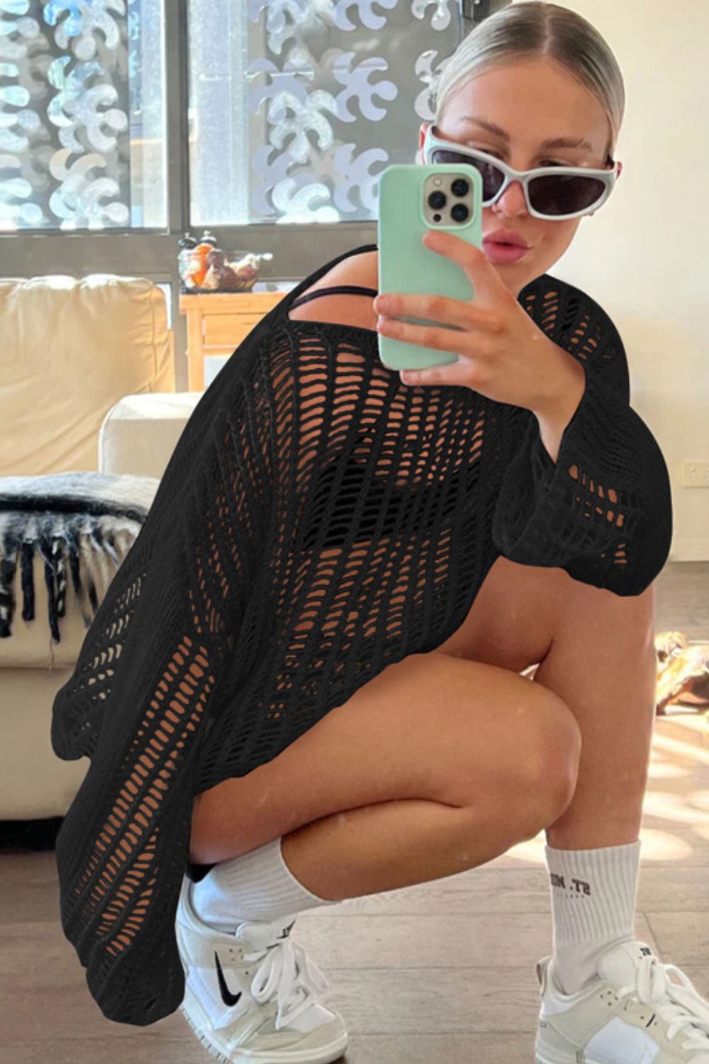 Openwork Boat Neck Long Sleeve Cover Up in solid color, featuring sheer fabric and long sleeves, perfect for beachwear.