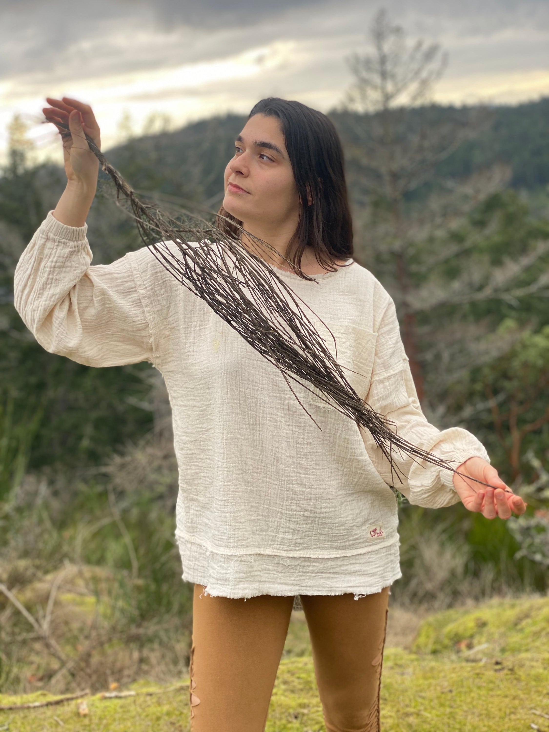 A cozy Organic Sustainable Cotton Sweatshirt in a neutral color, showcasing its soft texture and eco-friendly design.