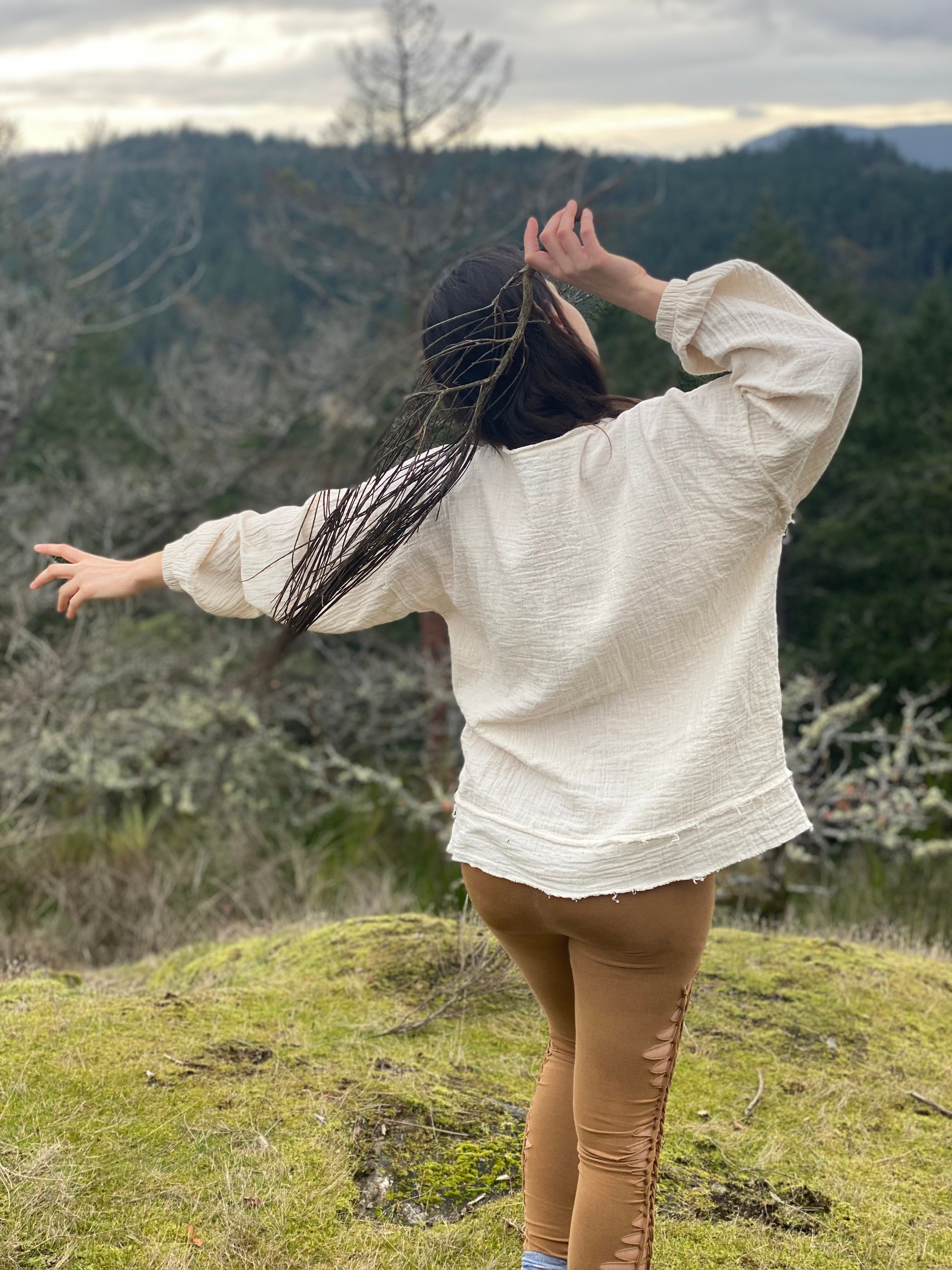 A cozy Organic Sustainable Cotton Sweatshirt in a neutral color, showcasing its soft texture and eco-friendly design.