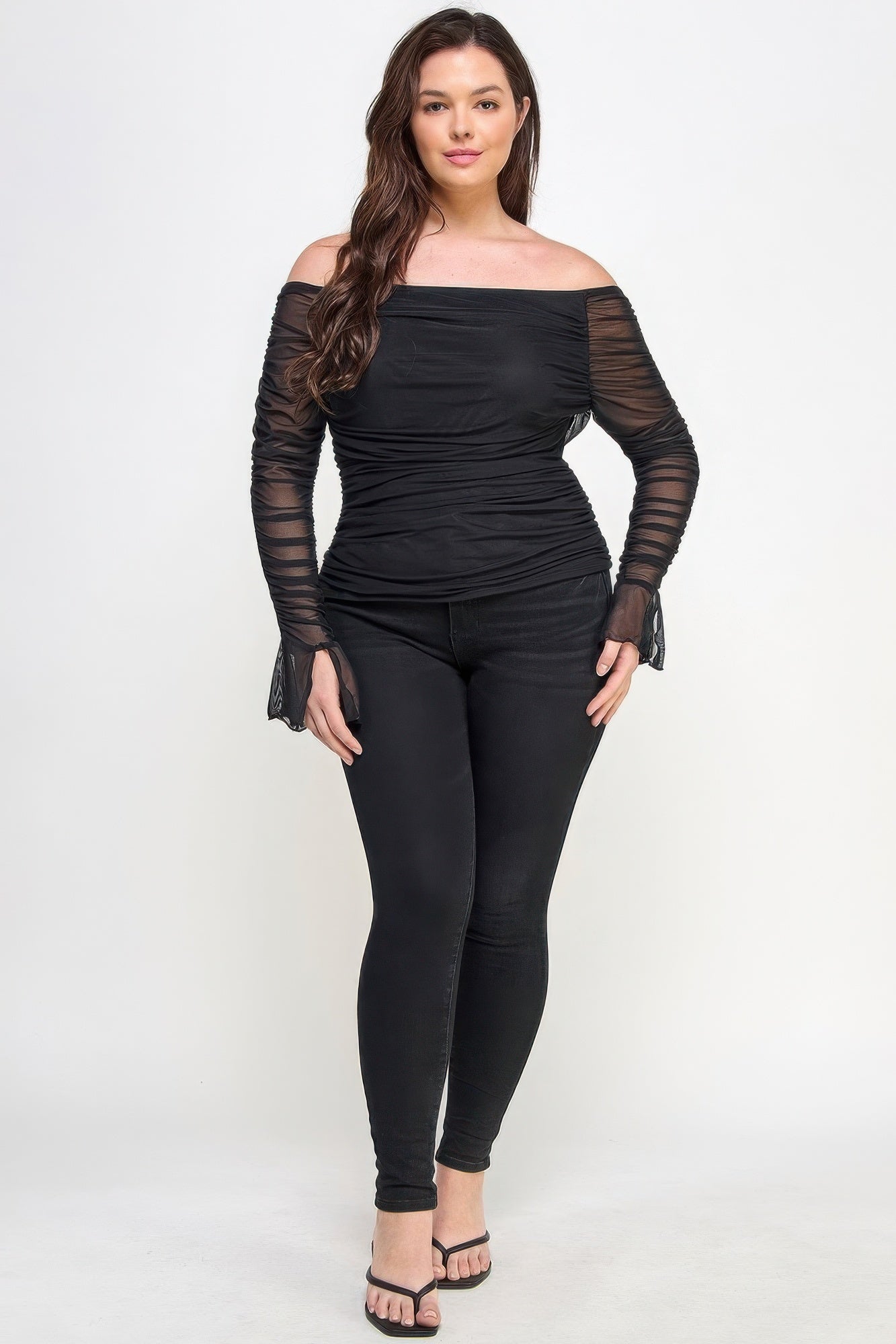 Ots Ruched Mesh Top featuring off-the-shoulder design and sheer ruched long sleeves in classic black color.