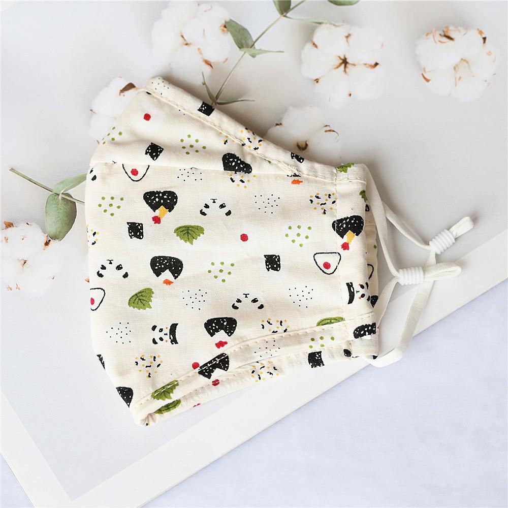 Pack of 4 adult cotton face masks in various prints, featuring a nose wire and soft elastic ear loops for comfort.