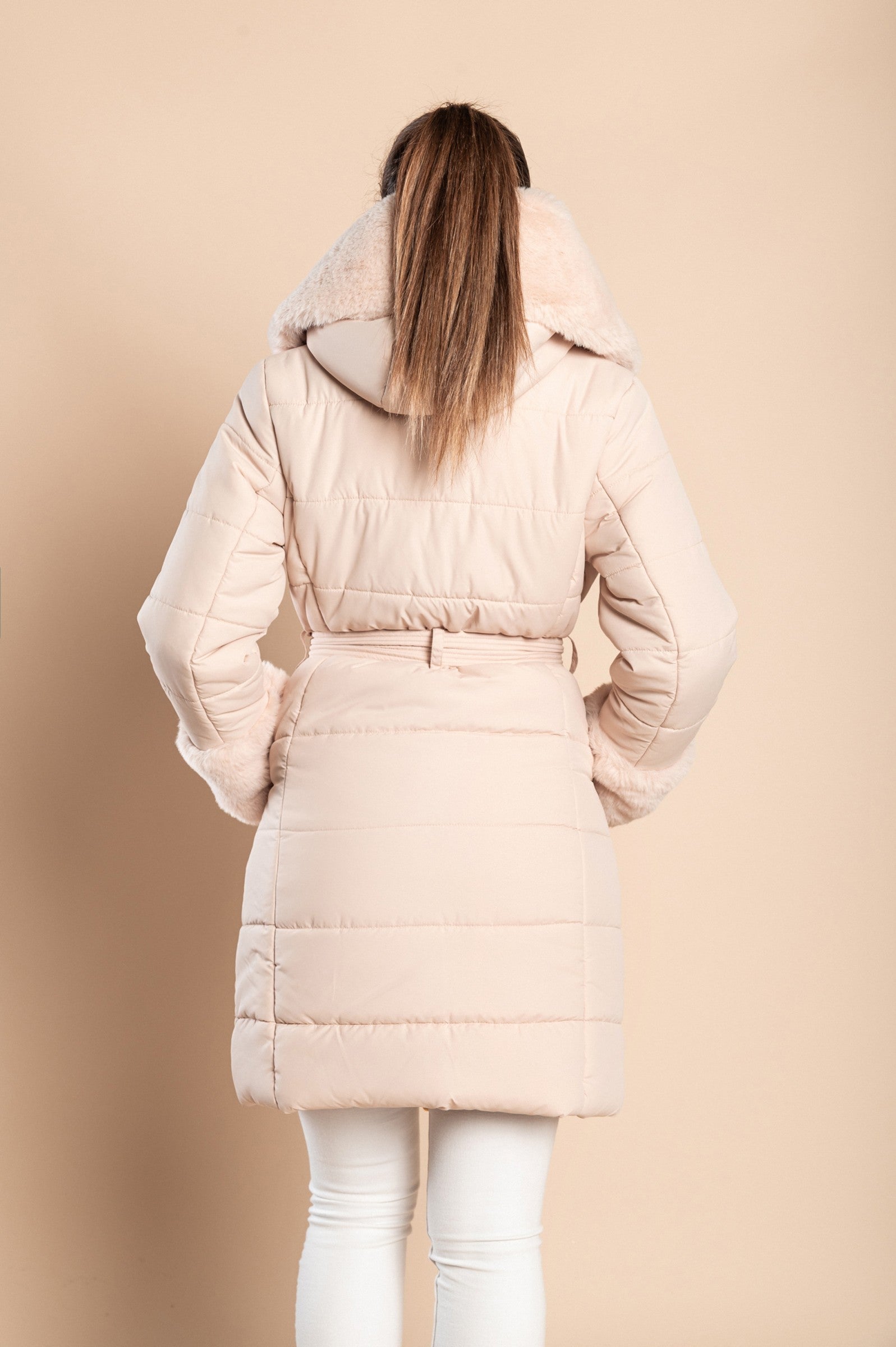Beige padded jacket with faux fur trim and side pockets, featuring a metal zipper and included belt.