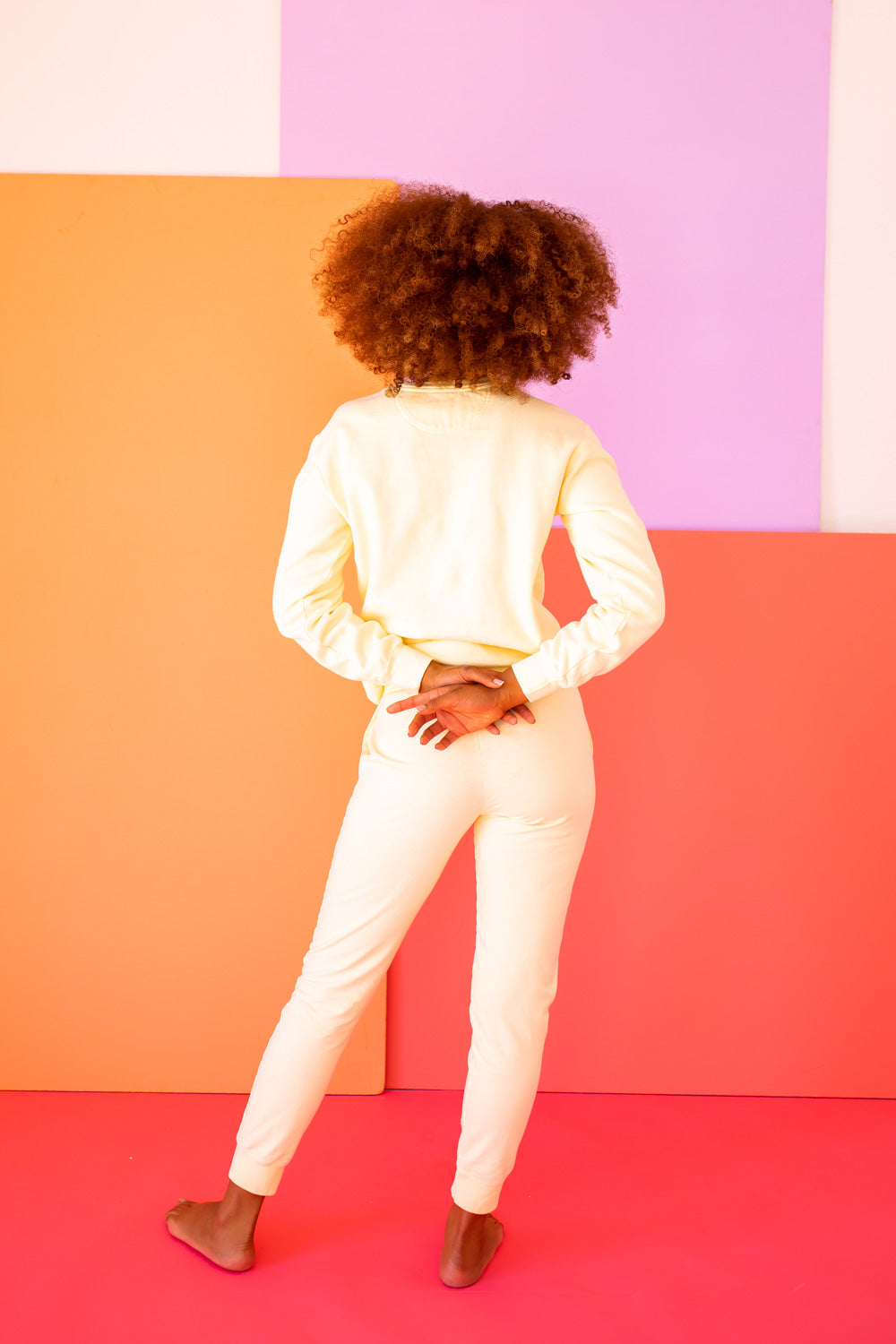 Ivory Peace Love and Sesame Sweatshirt made from 100% upcycled cotton, featuring a playful design that embodies love and peace.