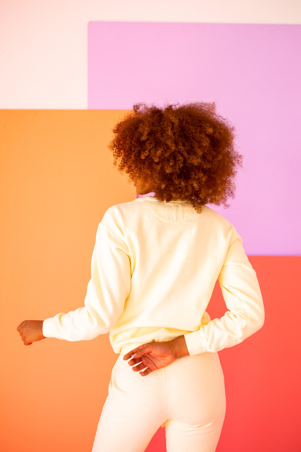 Ivory Peace Love and Sesame Sweatshirt made from 100% upcycled cotton, featuring a playful design that embodies love and peace.