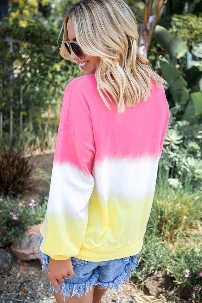 A stylish pink color block tie dye pullover sweatshirt featuring vibrant shades of pink and a relaxed fit, perfect for casual wear.