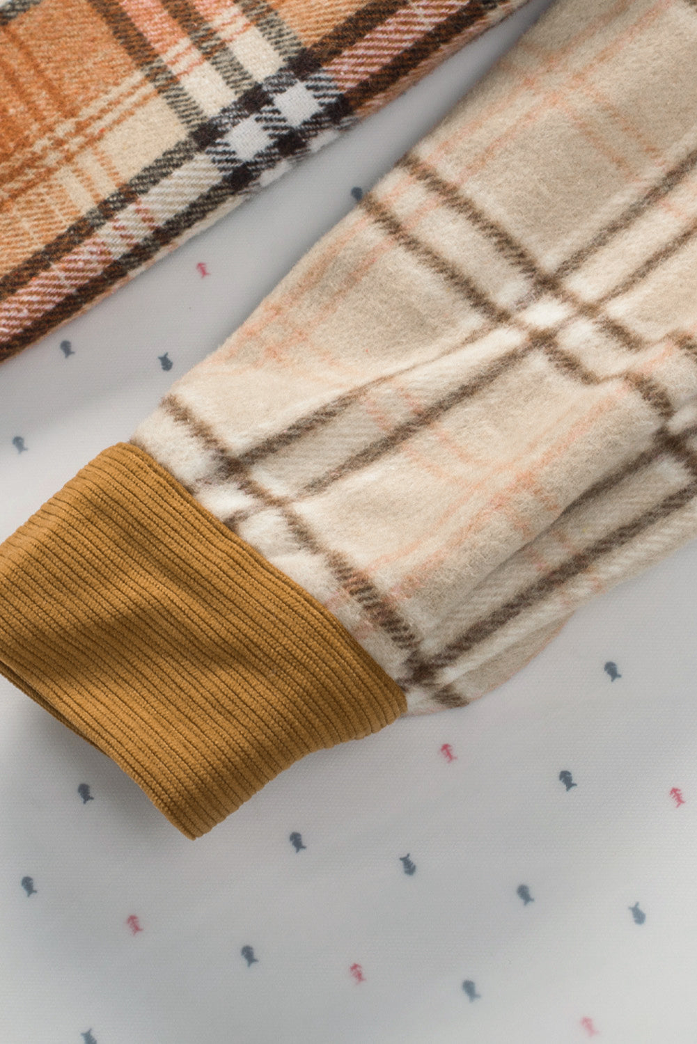 Orange plaid color block patchwork shirt jacket with pocket, showcasing unique patterns and stylish design.