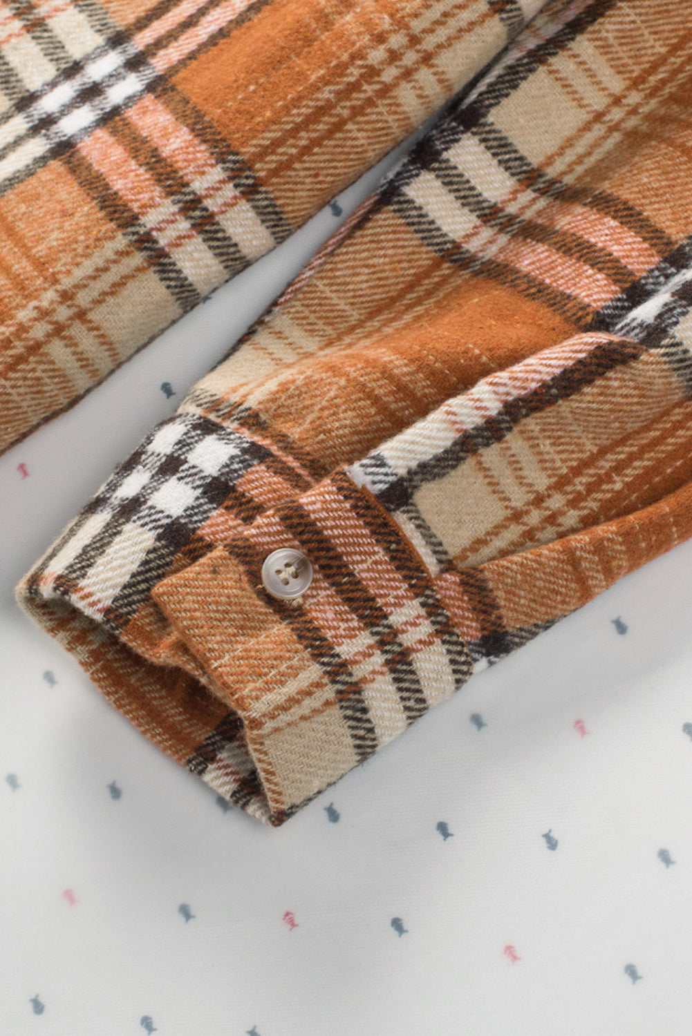 Orange plaid color block patchwork shirt jacket with pocket, showcasing unique patterns and stylish design.