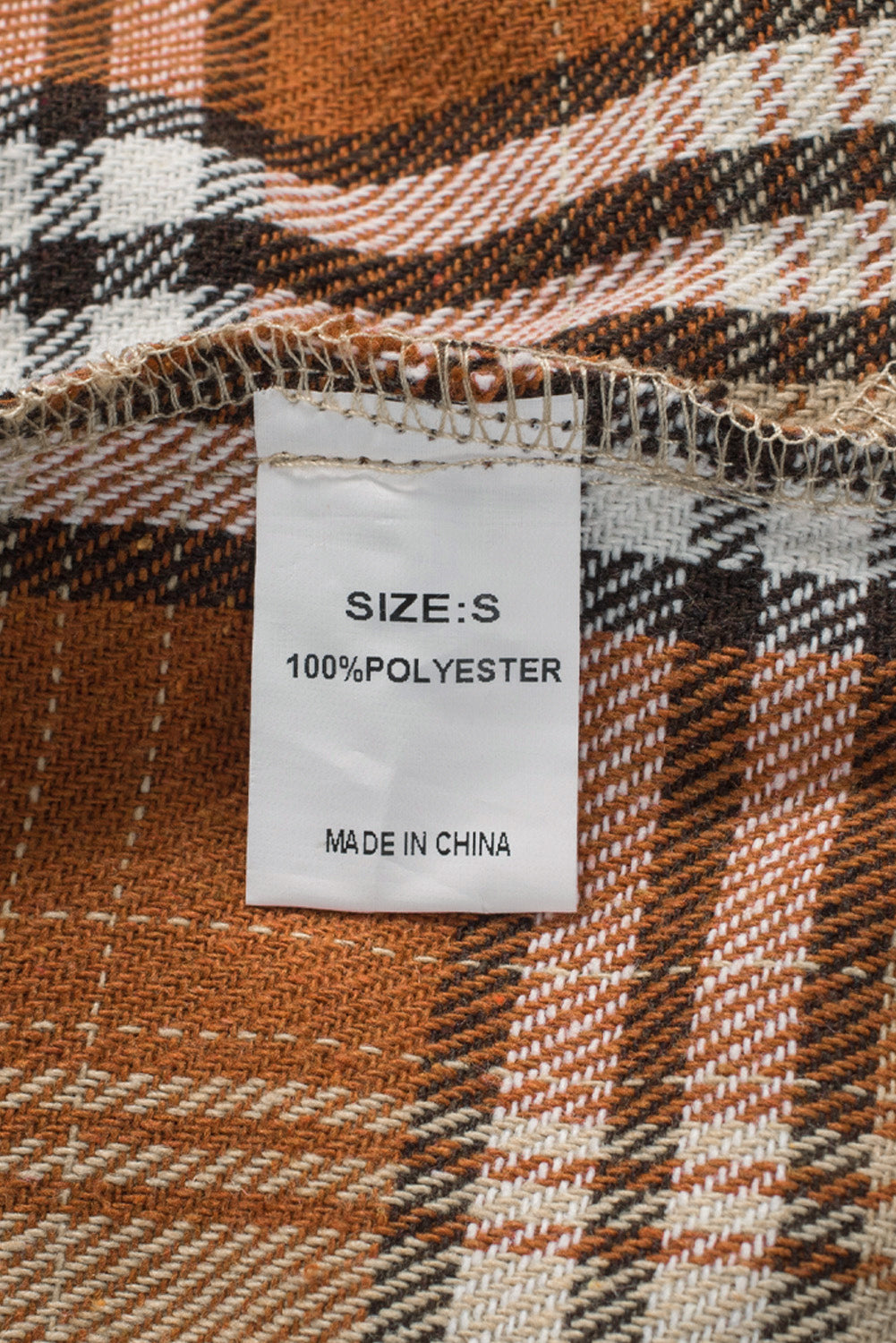 Orange plaid color block patchwork shirt jacket with pocket, showcasing unique patterns and stylish design.