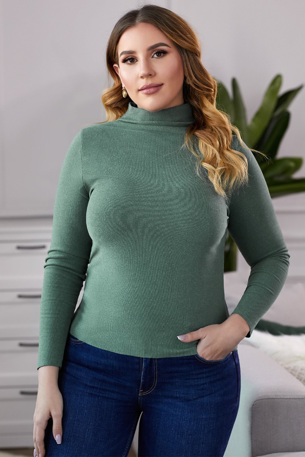 A stylish Plain Turtleneck Ribbed Plus Size Top in a soft fabric, showcasing its elegant design and slim fit, perfect for colder weather.
