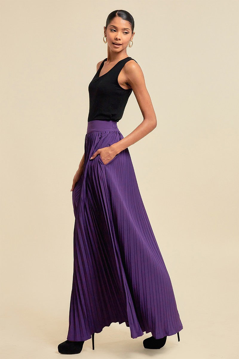 A stylish pleated skirt in regal purple featuring functional buttons and pockets, perfect for various occasions.
