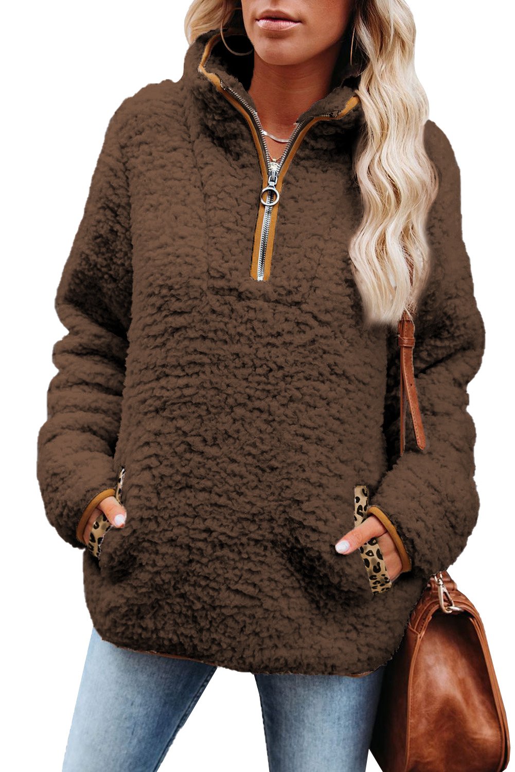 A cozy Pocketed Sherpa Pullover Sweatshirt featuring a half zip collar, long sleeves, and a stylish leopard trim on the pockets.