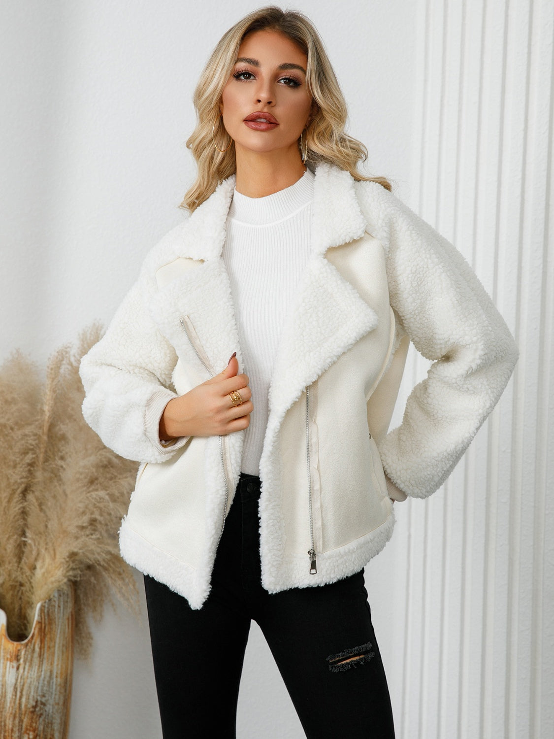 Cozy Pocketed Sherpa Zip Up Long Sleeve Jacket in a stylish design, featuring pockets and a soft texture, perfect for casual wear.