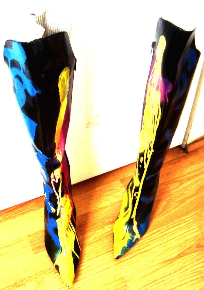 Stylish Pointed Black Boot with custom handpainted design and zipper closure, showcasing vibrant colors.