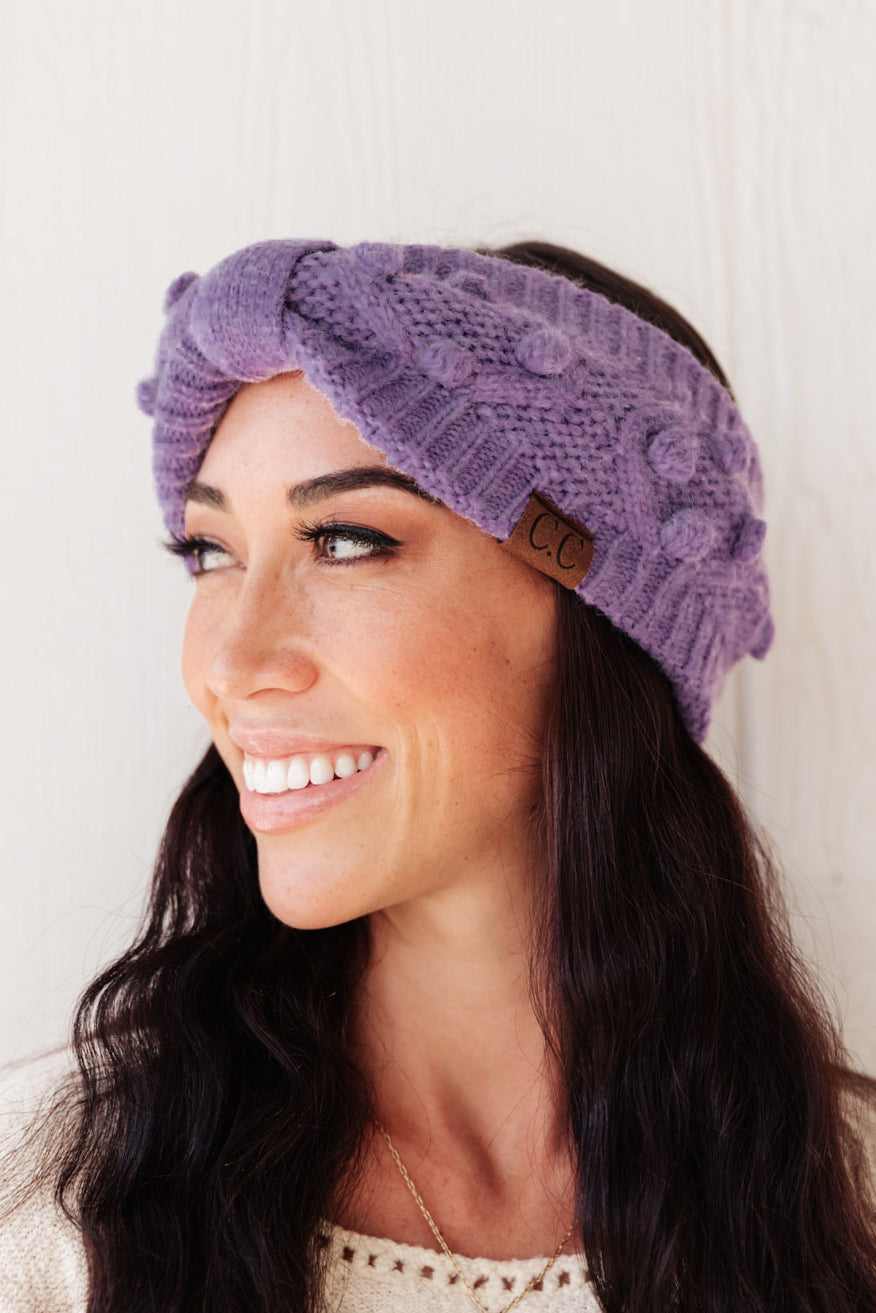 Pom Knit Head Wrap in Periwinkle with handmade baubles, showcasing a soft stretch knit design perfect for winter.