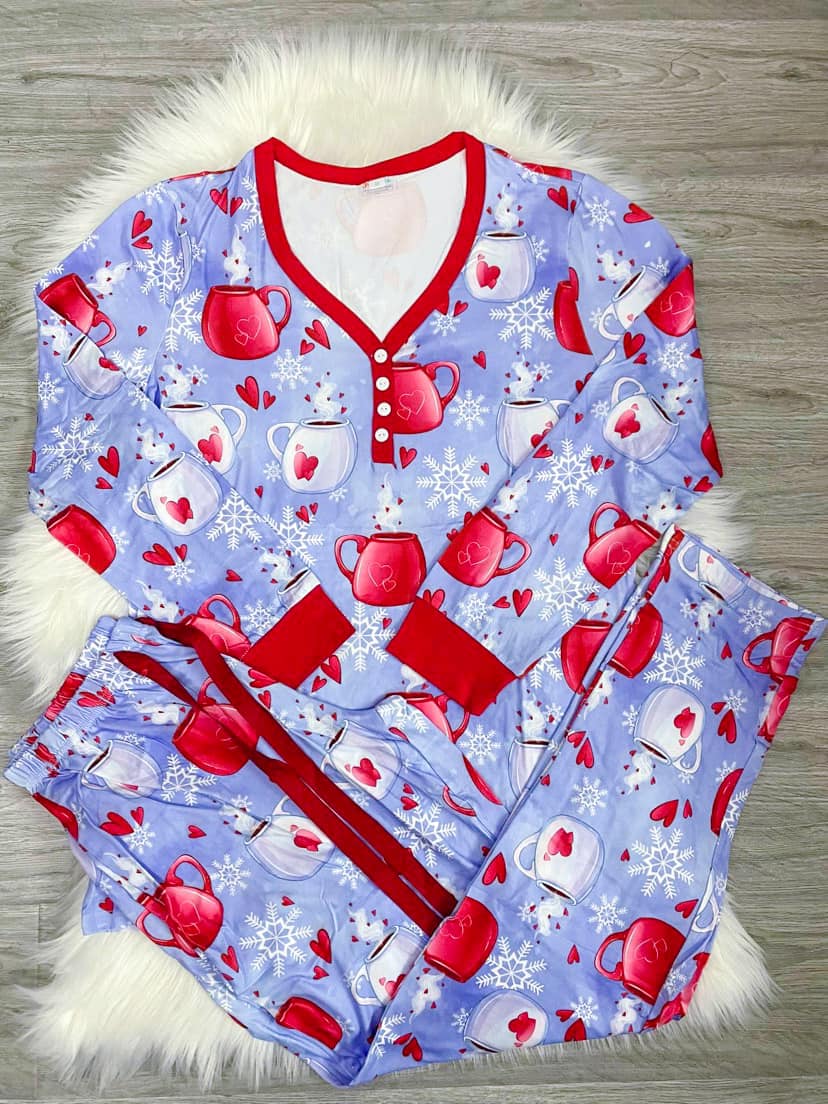Long Sleeve Pajama Set in Hearts featuring soft fabric, pockets, and a relaxed fit, perfect for cozy nights.