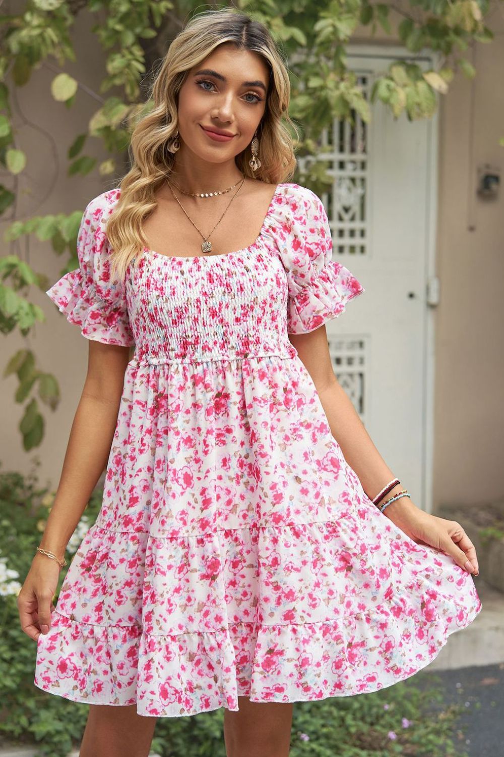 A stylish Printed Flounce Sleeve Smocked Dress featuring a floral pattern, square neckline, and puff sleeves, perfect for casual outings.