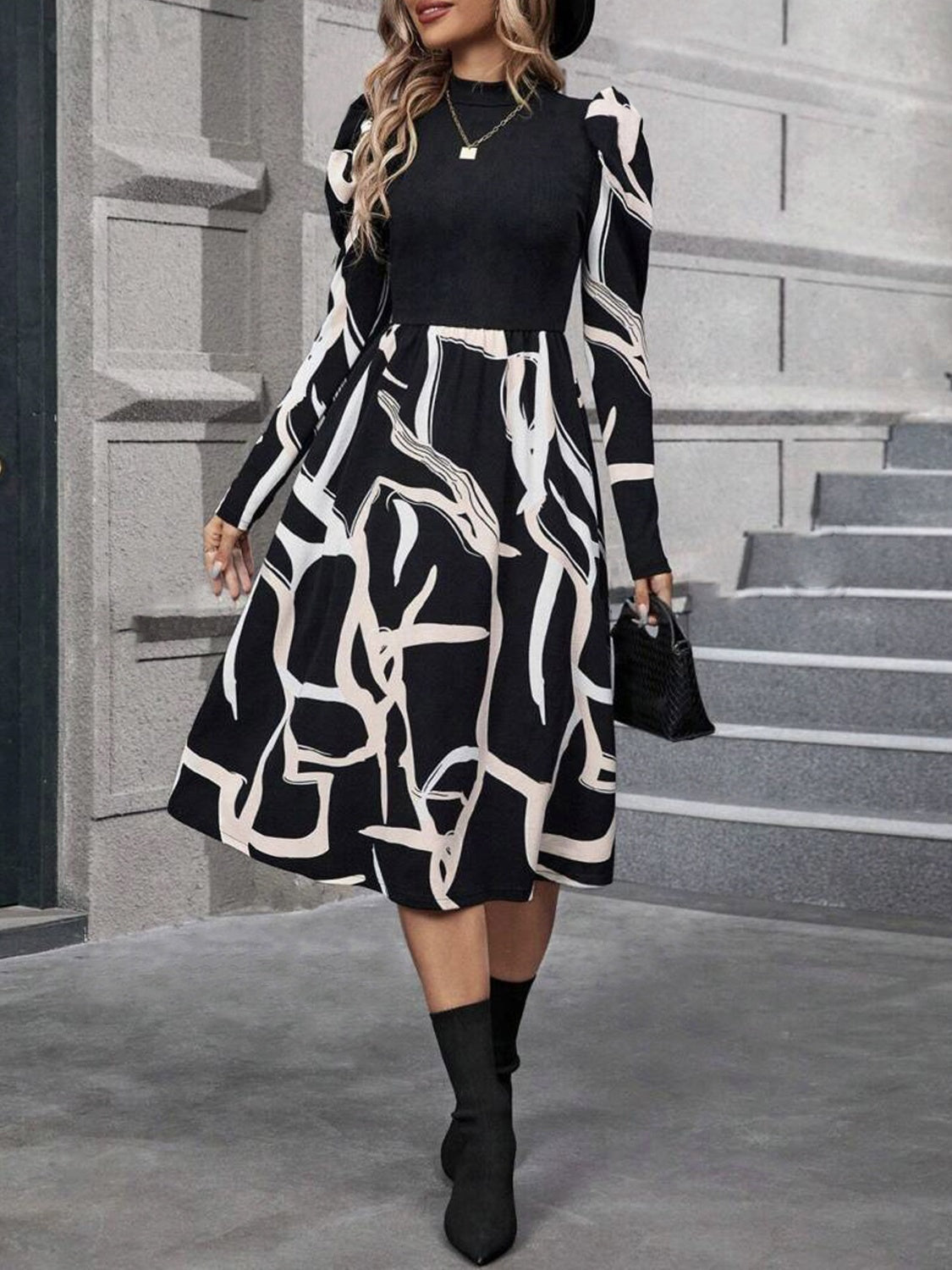 A stylish Printed Mock Neck Puff Sleeve Mini Dress featuring elegant puff sleeves and a chic design, perfect for various occasions.