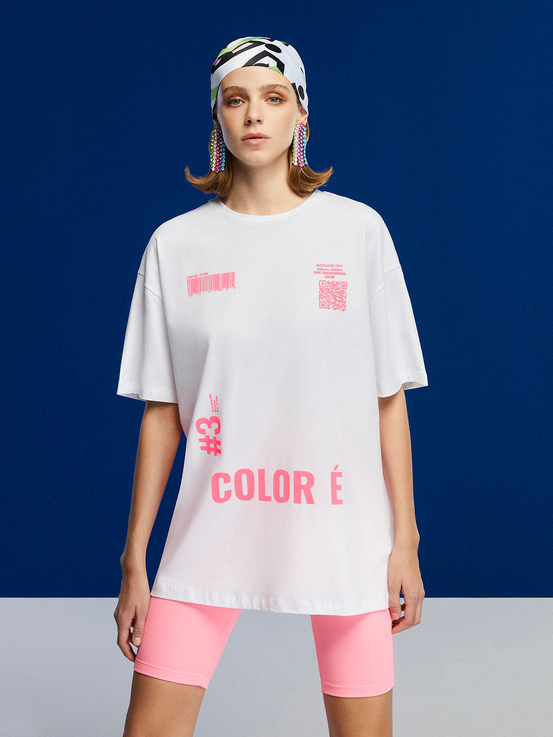 A stylish Printed Oversized T-Shirt featuring a crew-neck design and unique print details on the front and back, made from 100% organic cotton.