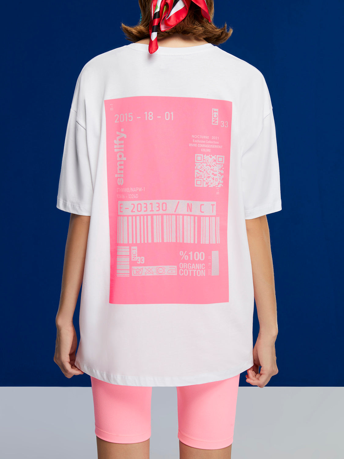 A stylish Printed Oversized T-Shirt featuring a crew-neck design and unique print details on the front and back, made from 100% organic cotton.