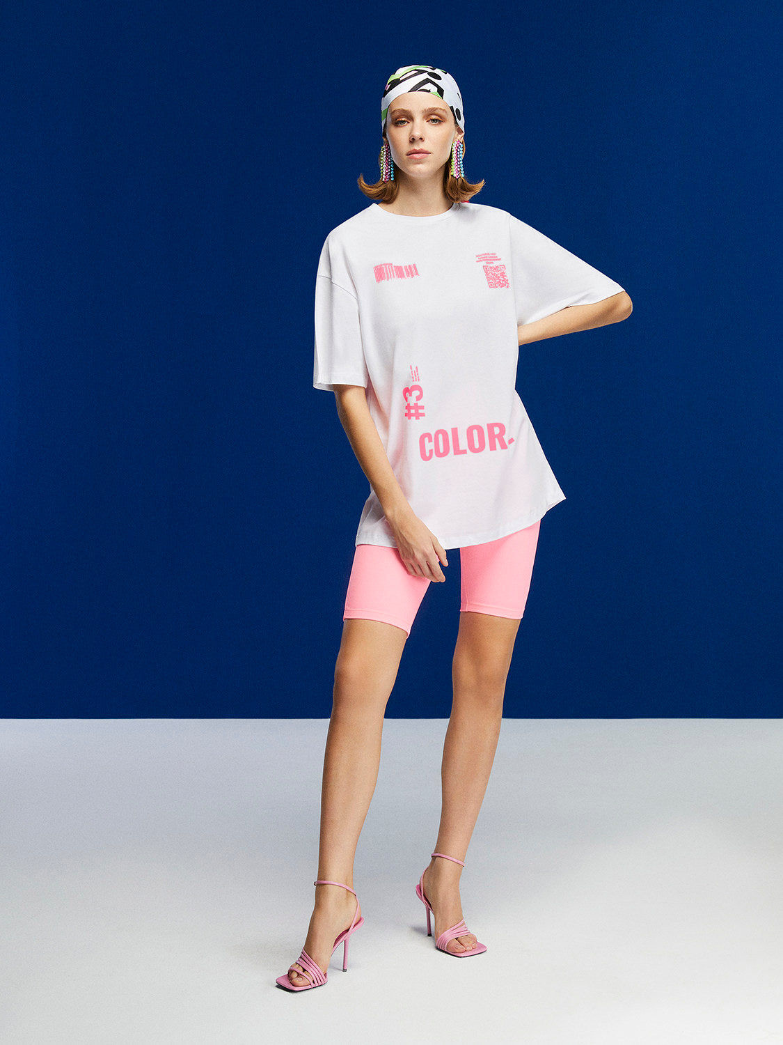 A stylish Printed Oversized T-Shirt featuring a crew-neck design and unique print details on the front and back, made from 100% organic cotton.