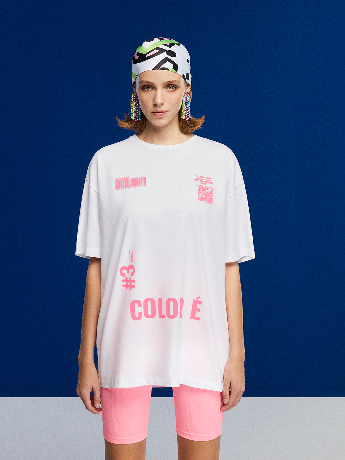 A stylish Printed Oversized T-Shirt featuring a crew-neck design and unique print details on the front and back, made from 100% organic cotton.