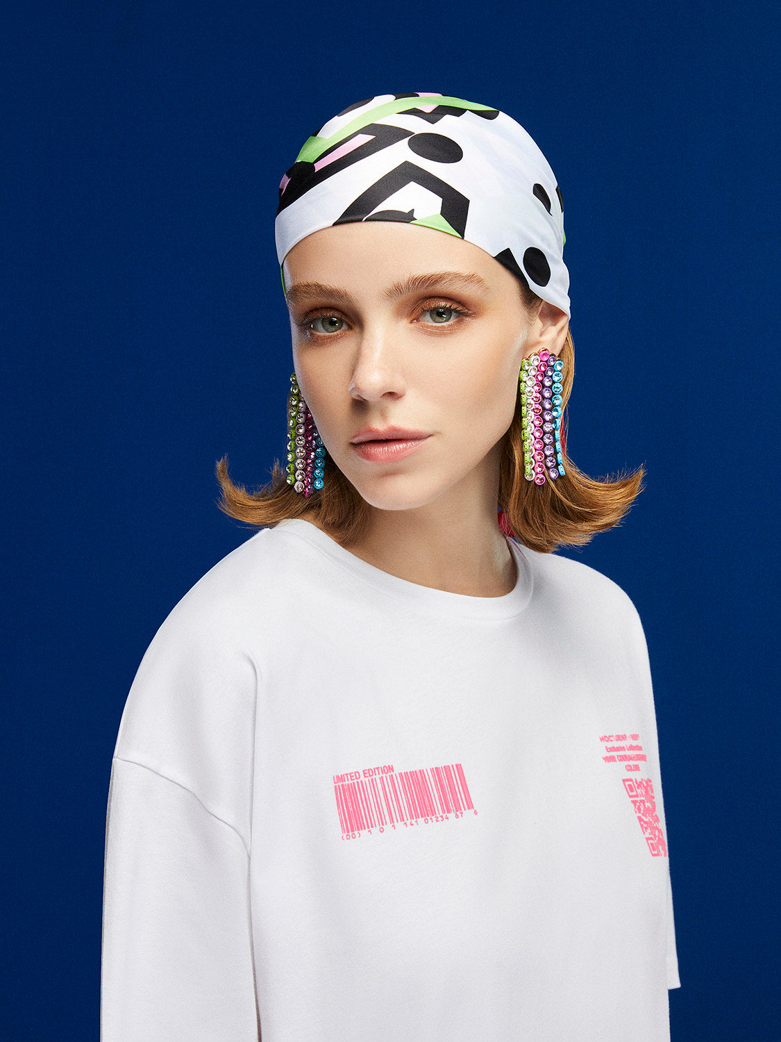 A stylish Printed Oversized T-Shirt featuring a crew-neck design and unique print details on the front and back, made from 100% organic cotton.