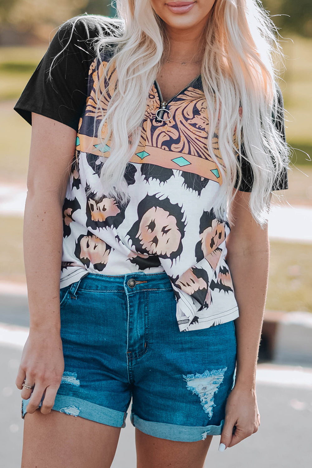 A stylish Printed Zip-Collar Short Raglan Sleeve Tee featuring a unique print, zip collar, and short sleeves, perfect for casual wear.