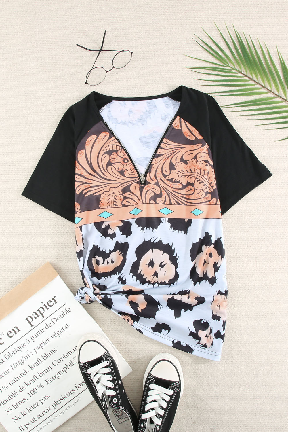 A stylish Printed Zip-Collar Short Raglan Sleeve Tee featuring a unique print, zip collar, and short sleeves, perfect for casual wear.