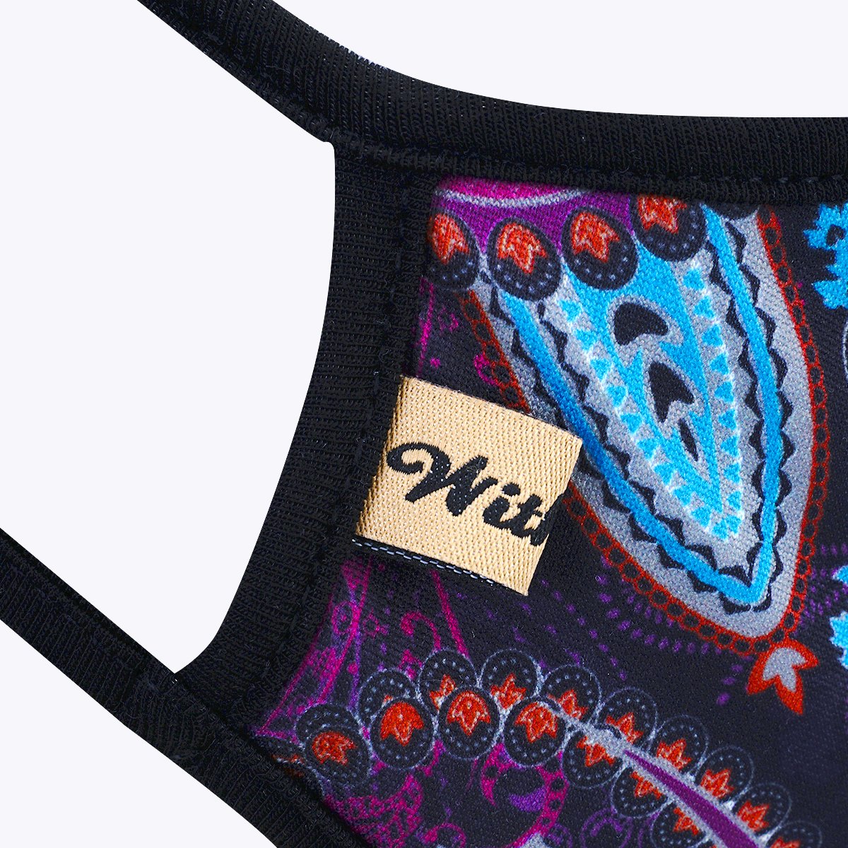 Purpler Paisley 3-Layered Face Cover featuring a vibrant paisley design, made from polyester and cotton, suitable for unisex wear.