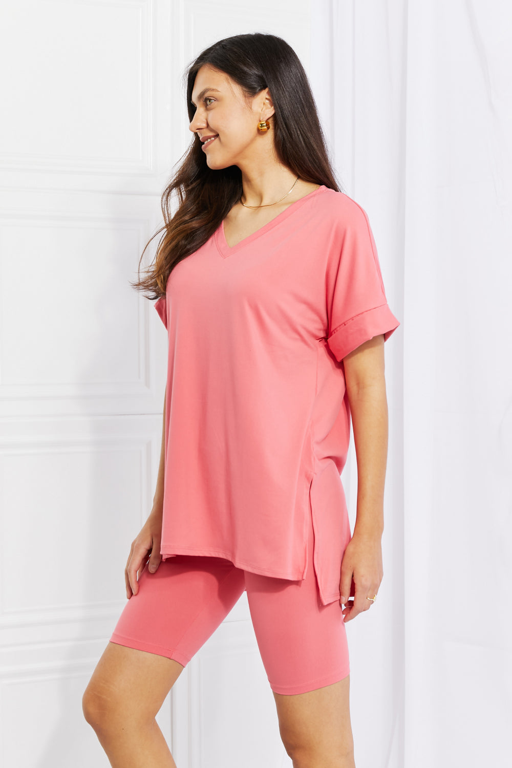 Quiet Moments Brushed Lounge Set in Coral featuring a soft microfiber top and high-rise biker shorts, perfect for lounging.