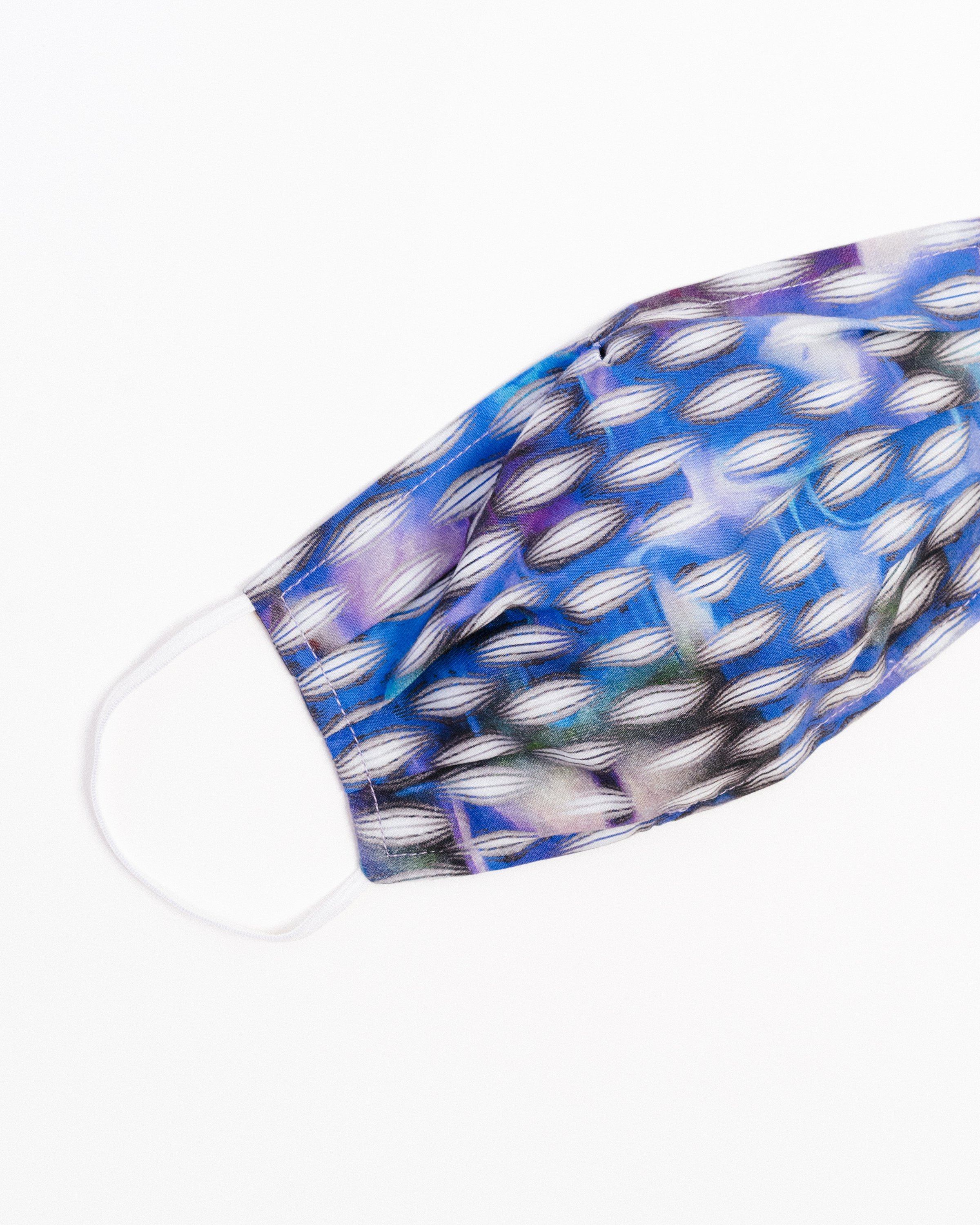 Realm Face Mask made of breathable cotton with pleats for comfort, featuring a stylish print suitable for all genders.