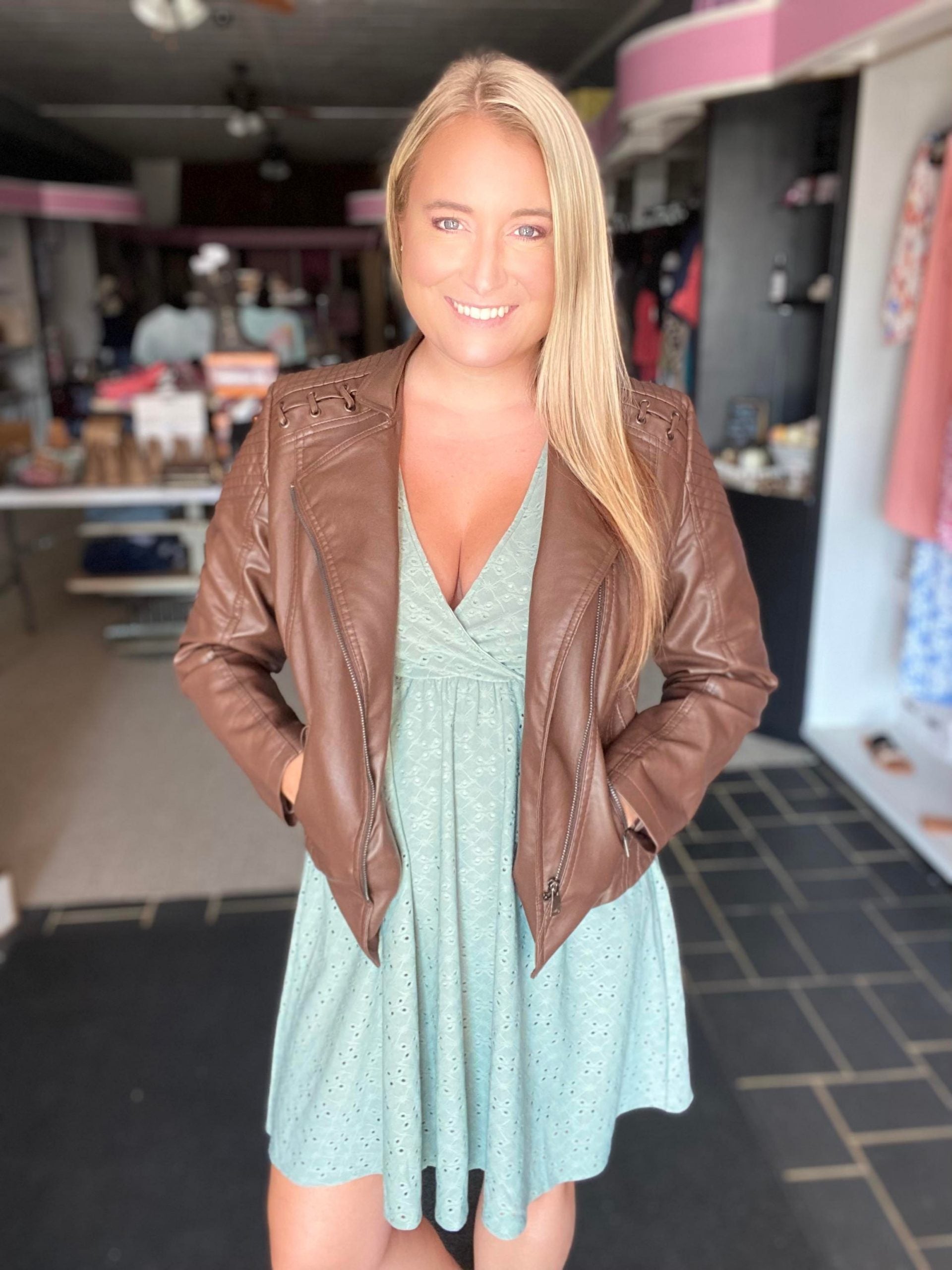 Rebecca Ruffle Eyelet Dress displayed in seven colors, showcasing its soft fabric, elastic waistband, and flattering design.