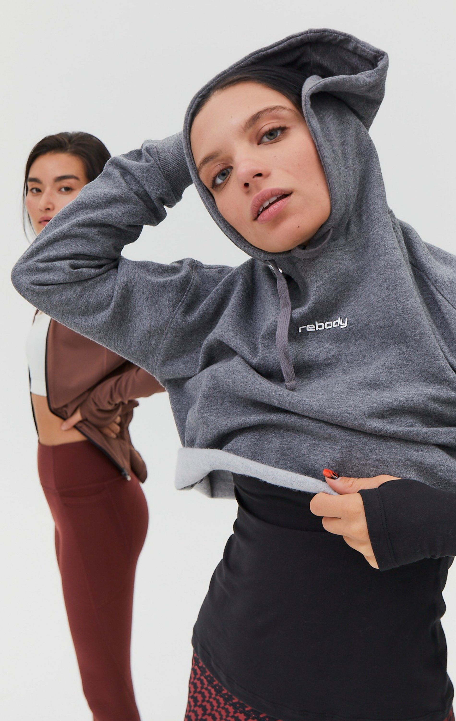 Rebody Logo Fleece Crop Hoody in a stylish cropped design, featuring plush fleece fabric and raw edge details, perfect for layering.
