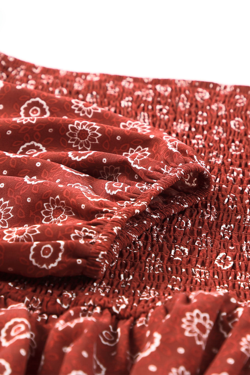 A stylish red plus size square neck printed peplum top, featuring a flattering shirred neckline and elegant pattern print, perfect for various outfits.