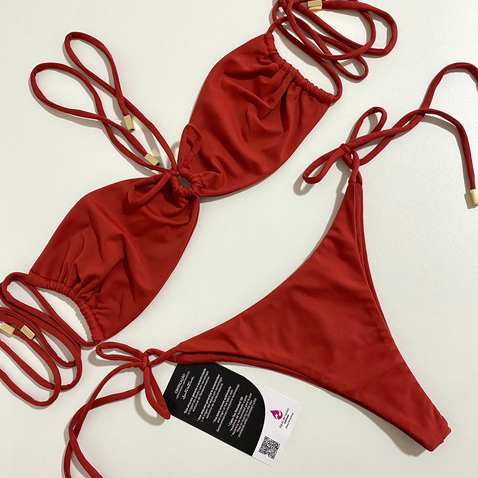 RHODE Top in Rose Red, featuring shimmering fabric and adjustable tie string, perfect for summer styling.