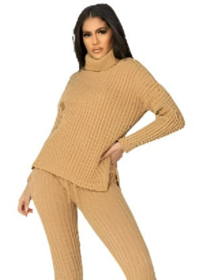 A stylish beige rib knit roll neck jumper and legging lounge set displayed on a mannequin, showcasing its soft texture and comfortable fit.
