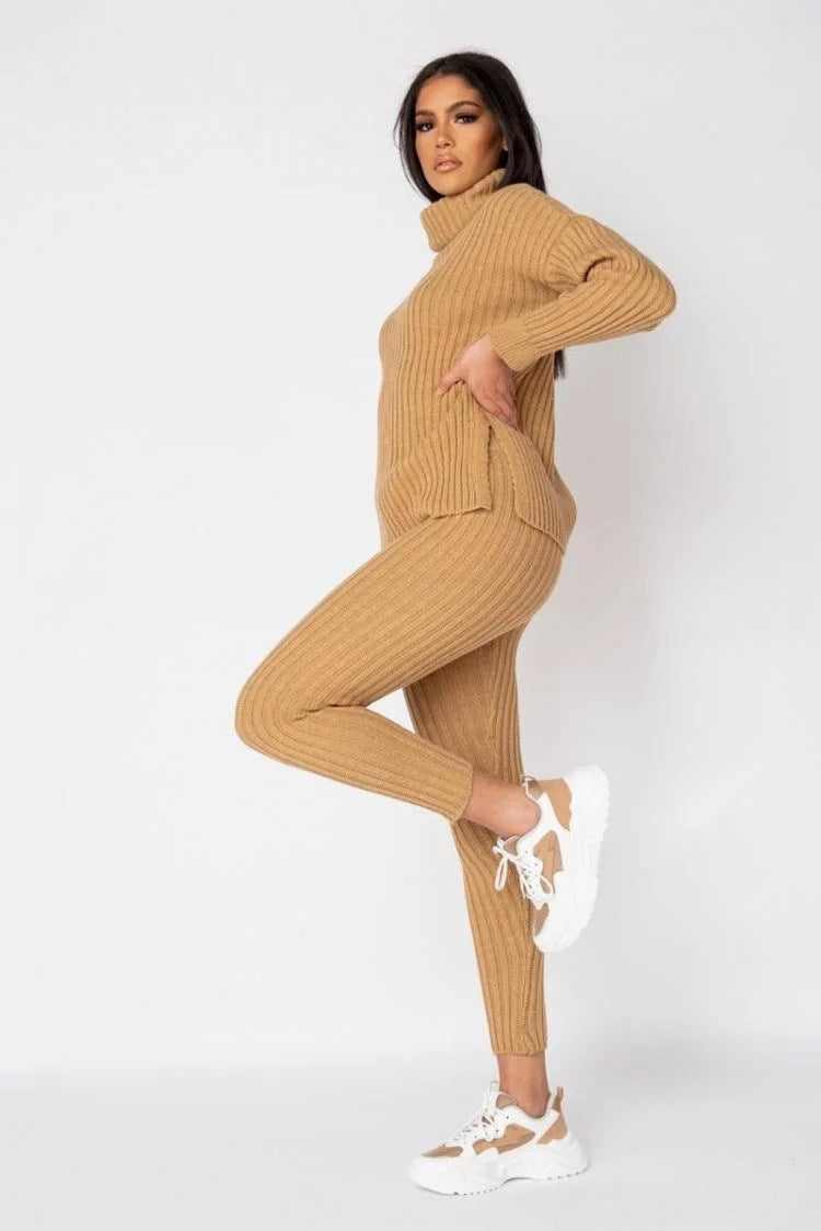 A stylish beige rib knit roll neck jumper and legging lounge set displayed on a mannequin, showcasing its soft texture and comfortable fit.